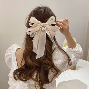 Elegant Cream Bow with Pearl Accents